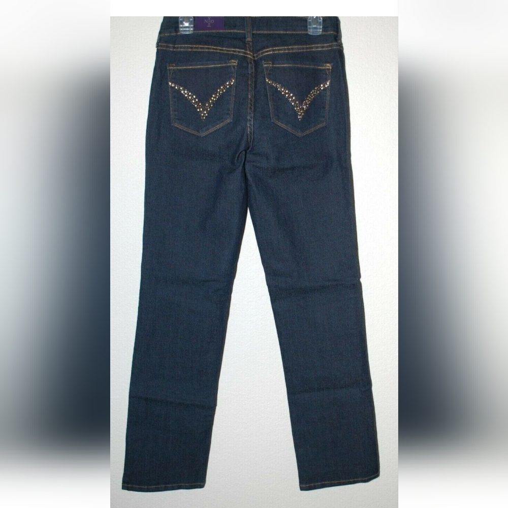 Size 4 Embellished NYDJ women's jeans in a beautiful  blue shade. Crafted